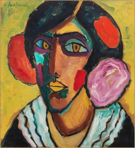 "Cabeza de mujer con flores en el pelo"