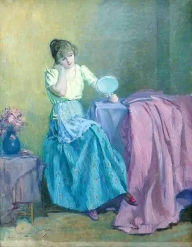 Istuva nuori nainen