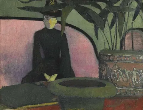 Mujer sentada en un sofá rosa Hacia 1887
