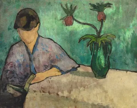 Mujer joven leyendo en kimono 1887