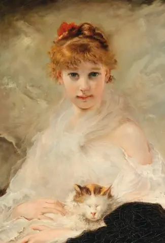 niña con un gato