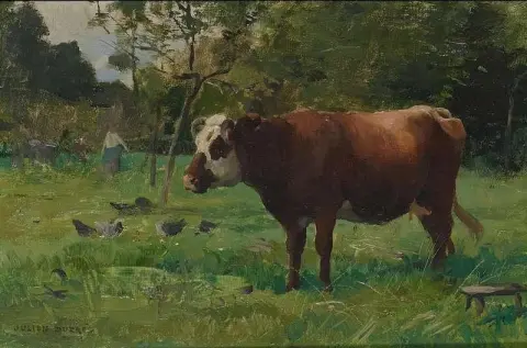 Een koe in de weide met een melkmeisje in de verte