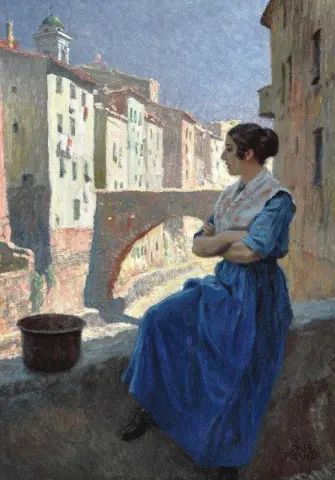 Eine Italienerin macht an einem schattigen Ort an einer Brücke in San Remo Halt