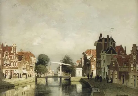 En solbelyst kanal med en trekkbro