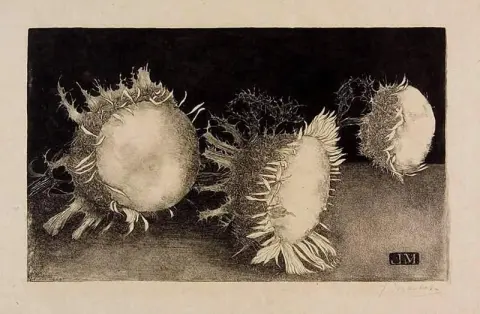 Tre fiori di cardo