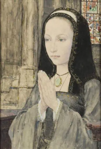 Donna che prega tre quarti
