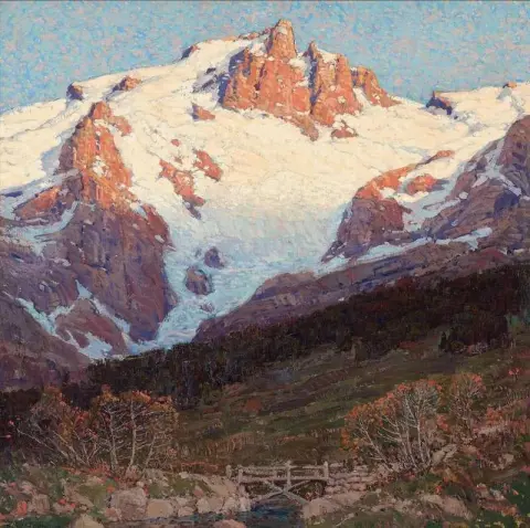 白雪皑皑的山峰下的人行桥，约 1921-23 年