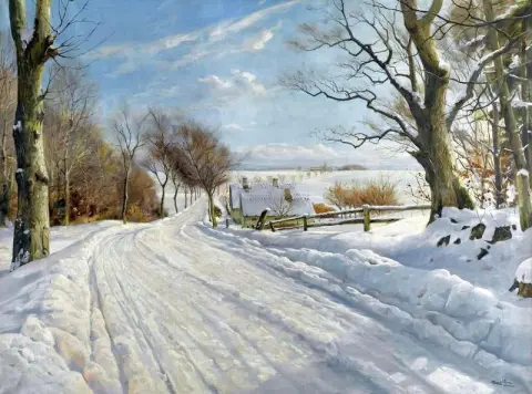 Uma estrada coberta de neve
