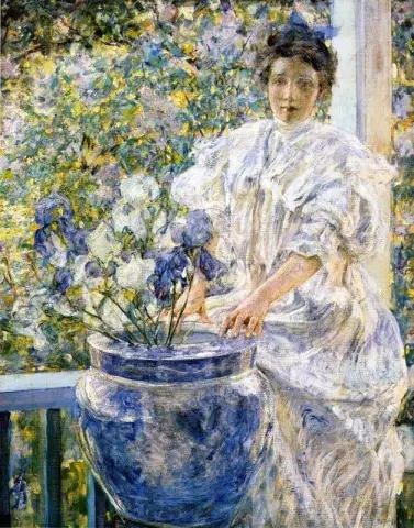 门廊上鲜花盛开的女人，约 1906 年