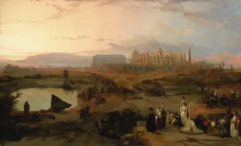 1845 年卡纳克日落时的大神庙遗址