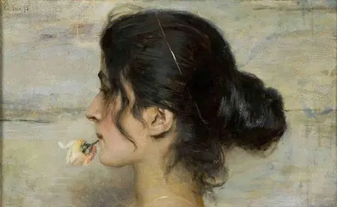 Con la rosa entre los labios