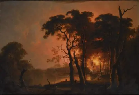En eld sedd genom träd 1776