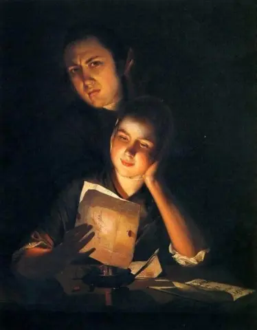 En flicka läser ett brev i levande ljus med en ung man som tittar över hennes axel 1760-62