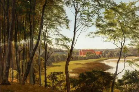 Boslandschap met uitzicht op Rugard