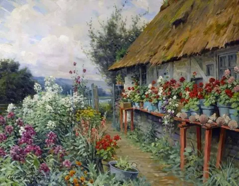 Jardín de cabañas en flor